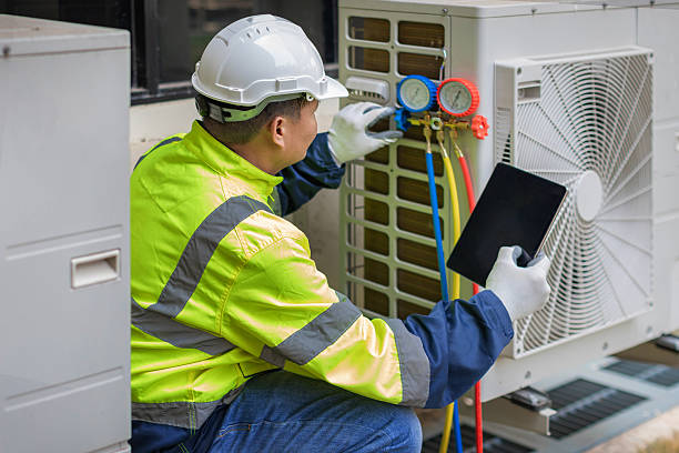 Professional Hvac technician working in Harrisonville, MO